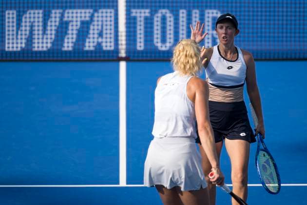 (251010) -- WUHAN, Oct. 10, 2025 -- Storm Hunter (R) Katerina Siniakova celebrate during the women s doubles quarterfinal between Chan Hao-Ching (Chinese Taipei) Jiang Xinyu (China) and Storm Hunter (Australia) Katerina Siniakova (the Czech Republic) at the 2025 Wuhan Open tennis tournament in Wuhan, central China s Hubei Province, Oct. 10, 2025. ) (SP)CHINA-WUHAN-TENNIS-WUHAN OPEN-WOMEN S DOUBLES-QUARTERFINAL (CN) WuxZhizun 