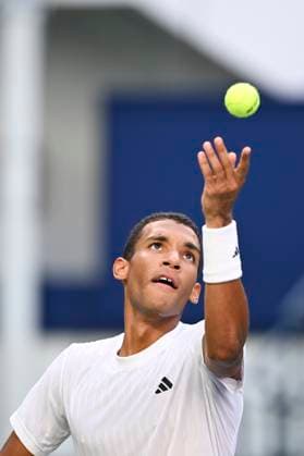 (251010) -- SHANGHAI, Oct. 10, 2025 -- Felix Auger-Aliassime of Canada serves to Arthur Rinderknech of France during the men s singles quarterfinal at the ATP, Tennis Herren World Tour Shanghai Masters tennis tournament in Shanghai, east China, Oct. 10, 2025. ) (SP)CHINA-SHANGHAI-TENNIS-ATP TOUR-SHANGHAI MASTERS-MEN S SINGLES (CN) ChenxHaoming 