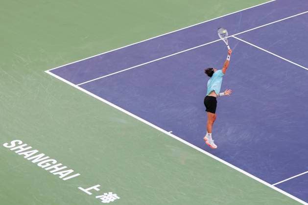 (251010) -- SHANGHAI, Oct. 10, 2025 -- Arthur Rinderknech of France serves to Felix Auger-Aliassime of Canada during the men s singles quarterfinal at the ATP, Tennis Herren World Tour Shanghai Masters tennis tournament in Shanghai, east China, Oct. 10, 2025. ) (SP)CHINA-SHANGHAI-TENNIS-ATP TOUR-SHANGHAI MASTERS-MEN S SINGLES (CN) WangxXiang 