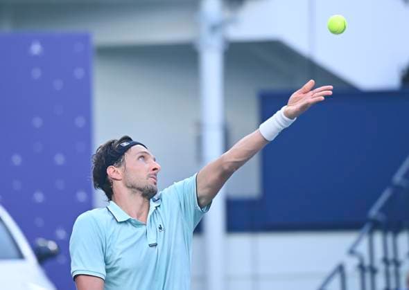 (251010) -- SHANGHAI, Oct. 10, 2025 -- Arthur Rinderknech of France serves to Felix Auger-Aliassime of Canada during the men s singles quarterfinal at the ATP, Tennis Herren World Tour Shanghai Masters tennis tournament in Shanghai, east China, Oct. 10, 2025. ) (SP)CHINA-SHANGHAI-TENNIS-ATP TOUR-SHANGHAI MASTERS-MEN S SINGLES (CN) ChenxHaoming 