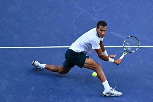 (251010) -- SHANGHAI, Oct. 10, 2025 -- Felix Auger-Aliassime of Canada hits a return to Arthur Rinderknech of France during the men s singles quarterfinal at the ATP, Tennis Herren World Tour Shanghai Masters tennis tournament in Shanghai, east China, Oct. 10, 2025. ) (SP)CHINA-SHANGHAI-TENNIS-ATP TOUR-SHANGHAI MASTERS-MEN S SINGLES (CN) ChenxHaoming 