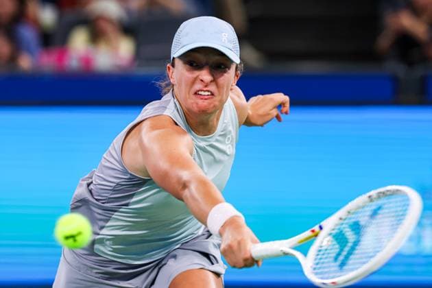 WUHAN, CHINA - OCTOBER 10: Iga Swiatek of Poland competes in the Women s Singles Quarterfinal match against Jasmine Paolini of Italy on day 7 of 2025 Wuhan Open at Optics Valley International Tennis Center on October 10, 2025 in Wuhan, Hubei Province of China.  Copyright: xVCGx 111596398426