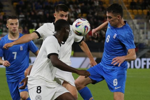 10.10.2025, xmohx, Fussball U 21 EM Qualifikation, Deutschland - Griechenland v.l. Noel Aseko (Deutsche Fussball Nationalmannschaft DFB U21, U 21 Nicolo Tresoldi (Deutsche Fussball Nationalmannschaft DFB U21) Sotirios Kontouris (Griechenland U21) Zweikampf, Aktion, action, battle for the ball (DFL DFB REGULATIONS PROHIBIT ANY USE OF PHOTOGRAPHS as IMAGE SEQUENCES and or QUASI-VIDEO) Jena