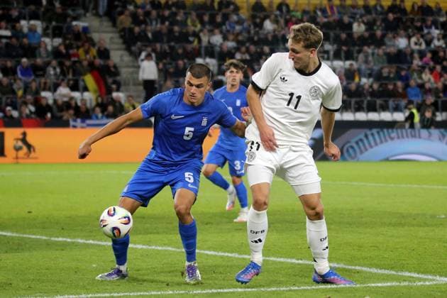 10.10.2025, xmohx, Fussball U 21 EM Qualifikation, Deutschland - Griechenland v.l. Christos Alexiou (Griechenland U21, U 21 Nelson Weiper (Deutsche Fussball Nationalmannschaft DFB U21) Zweikampf, Aktion, action, battle for the ball (DFL DFB REGULATIONS PROHIBIT ANY USE OF PHOTOGRAPHS as IMAGE SEQUENCES and or QUASI-VIDEO) Jena