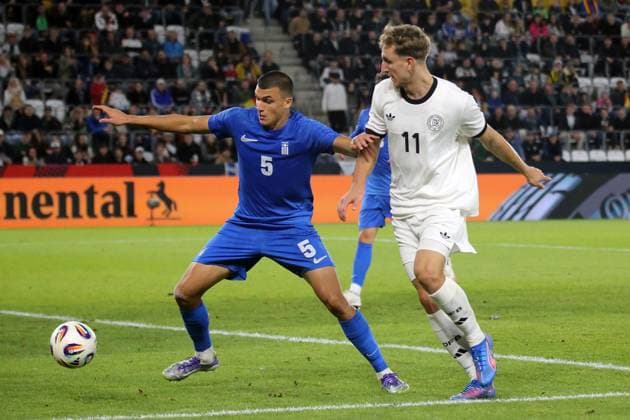 10.10.2025, xmohx, Fussball U 21 EM Qualifikation, Deutschland - Griechenland v.l. Christos Alexiou (Griechenland U21, U 21 Nelson Weiper (Deutsche Fussball Nationalmannschaft DFB U21) Zweikampf, Aktion, action, battle for the ball (DFL DFB REGULATIONS PROHIBIT ANY USE OF PHOTOGRAPHS as IMAGE SEQUENCES and or QUASI-VIDEO) Jena