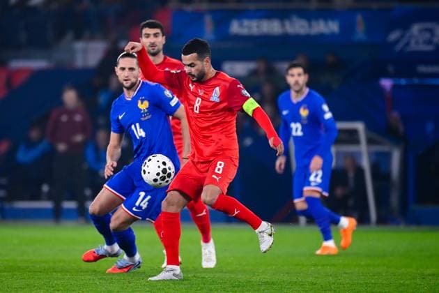 FOOTBALL : France vs Azerbaidjan - Paris - 10 10 2025 Emin Makhmudov ( 8 - Azerbaijan ) and Adrien Rabiot ( 14 - France ) during the European Qualifying round match between France and Azerbaijan at Parc des Princes on October 10, 2025 in Paris, France. ( Photo by Federico Pestellini PsnewZ ) - Parc des PrincesFrance  Copyright: xFedericoxPestellinix