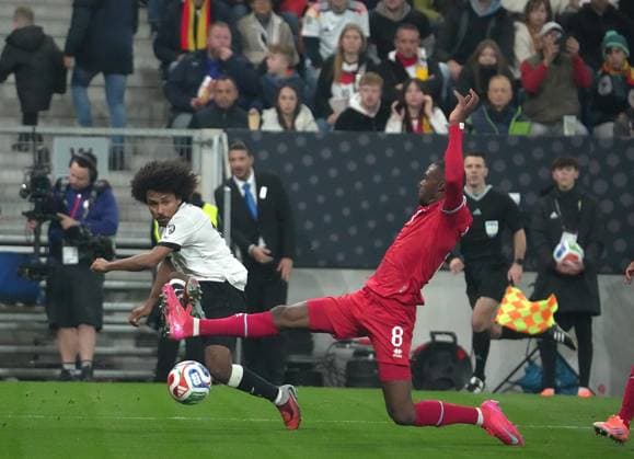 GER, WM-Qualifikation, Deutschland vs Luxemburg 10.10.2025, PreZero Arena, Sinsheim, GER, WM-Qualifikation, Deutschland vs Luxemburg , im Bild Karim Adeyemi (Deutschland), Christopher Martins (Luxemburg)