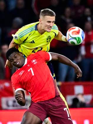 Sweden s Gustaf Lagerbielke against Switzerland s Breel Embolo during Friday s World Cup qualifying soccer match between Sweden and Switzerland at Strawberry Arena, October 10, 2025 in Stockholm, Sweden. STOCKHOLM SWEDEN x10030x