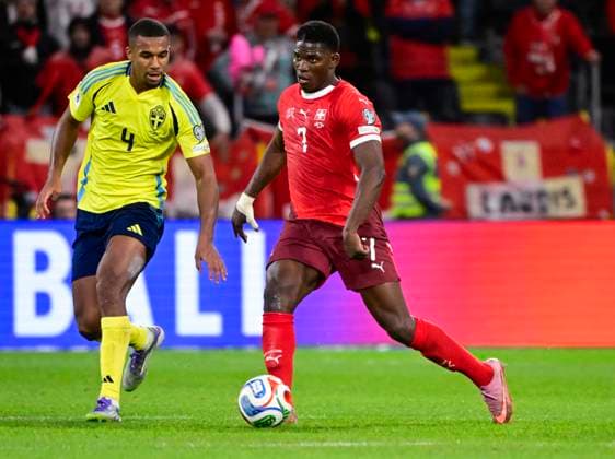 Sweden s Isak Hien against Switzerland s Breel Embolo during Friday s World Cup qualifying soccer match between Sweden and Switzerland at Strawberry arena, October 10, 2025 in Stockholm, Sweden. STOCKHOLM SWEDEN x10030x