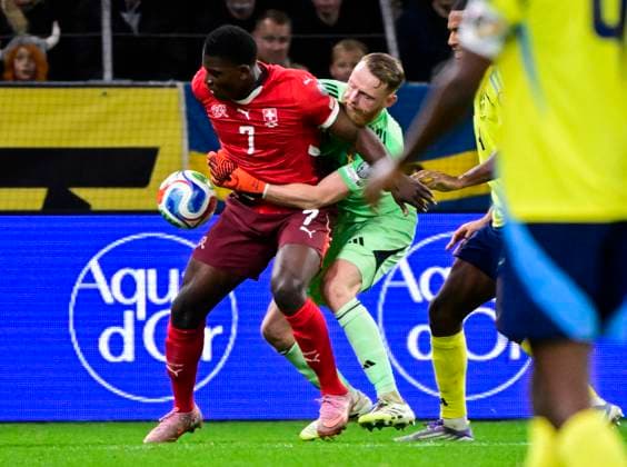 Switzerland s Breel Embolo against Sweden s goalkeeper Viktor Johansson during Friday s World Cup qualifying soccer match between Sweden and Switzerland at Strawberry arena, October 10, 2025 in Stockholm, Sweden. STOCKHOLM SWEDEN x10030x