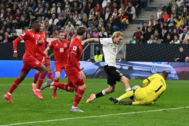 10.10.2025, xsltx, Fussball WM-Qualifikation 2026, Deutschland - Luxemburg v.l. Nick Woltermade (Deutsche Fussball Nationalmannschaft DFB) Anthony Moris (Luxemburg) Zweikampf, Aktion, action, battle for the ball (DFL DFB REGULATIONS PROHIBIT ANY USE OF PHOTOGRAPHS as IMAGE SEQUENCES and or QUASI-VIDEO) Sinsheim