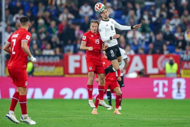 10.10.2025, Fußball, Länderspiel, Deutschland - Luxemburg, UEFA WM-Qualifikation, 2025 2026, Gruppe A, PreZero Arena in Sinsheim: Mathias Olesen (LUX 19) im Zweikampf gegen Leon Goretzka (GER 08) DFB regulations prohibit any use of photographs as image sequences and or quasi-video. Baden-Württemberg Deutschland