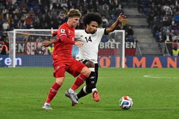 10.10.2025, xsltx, Fussball WM-Qualifikation 2026, Deutschland - Luxemburg v.l. Karim Adeyemi (Deutsche Fussball Nationalmannschaft DFB) Florian Bohnert (Luxemburg) Zweikampf, Aktion, action, battle for the ball (DFL DFB REGULATIONS PROHIBIT ANY USE OF PHOTOGRAPHS as IMAGE SEQUENCES and or QUASI-VIDEO) Sinsheim