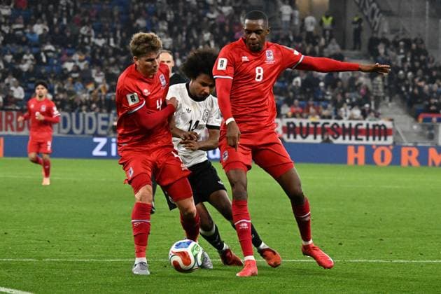 10.10.2025, xsltx, Fussball WM-Qualifikation 2026, Deutschland - Luxemburg v.l. Karim Adeyemi (Deutsche Fussball Nationalmannschaft DFB) Florian Bohnert (Luxemburg) Zweikampf, Aktion, action, battle for the ball Christopher Martins (Luxemburg) (DFL DFB REGULATIONS PROHIBIT ANY USE OF PHOTOGRAPHS as IMAGE SEQUENCES and or QUASI-VIDEO) Sinsheim