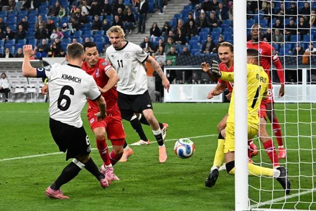 10.10.2025, xsltx, Fussball WM-Qualifikation 2026, Deutschland - Luxemburg v.l. Joshua Kimmich (Deutsche Fussball Nationalmannschaft DFB) Torschuetze, erzielt das Tor, Treffer, scores the goal 4:0 Anthony Moris (Luxemburg) (DFL DFB REGULATIONS PROHIBIT ANY USE OF PHOTOGRAPHS as IMAGE SEQUENCES and or QUASI-VIDEO) Sinsheim