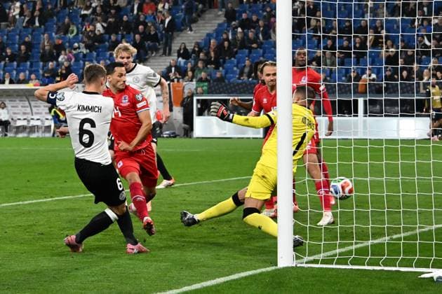 10.10.2025, xsltx, Fussball WM-Qualifikation 2026, Deutschland - Luxemburg v.l. Joshua Kimmich (Deutsche Fussball Nationalmannschaft DFB) Torschuetze, erzielt das Tor, Treffer, scores the goal 4:0 Anthony Moris (Luxemburg) (DFL DFB REGULATIONS PROHIBIT ANY USE OF PHOTOGRAPHS as IMAGE SEQUENCES and or QUASI-VIDEO) Sinsheim