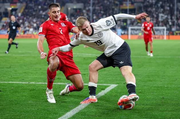 10.10.2025, Fußball, Länderspiel, Deutschland - Luxemburg, UEFA WM-Qualifikation, 2025 2026, Gruppe A, PreZero Arena in Sinsheim: Seid Korac (LUX 02) im Zweikampf gegen Jonathan Burkhardt (GER 19) DFB regulations prohibit any use of photographs as image sequences and or quasi-video. Baden-Württemberg Deutschland
