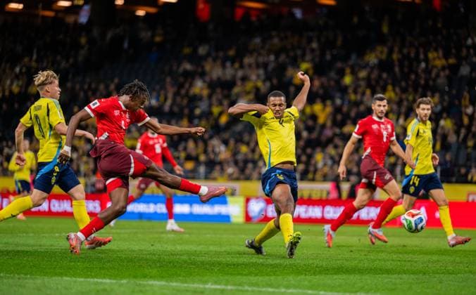 251010 Johan Manzamb of Switzerland scores the 0-2 goal against Isak Hien of Sweden during the FIFA World Cup, WM, Weltmeisterschaft, Fussball Qualifier football match between Sweden and Switzerland on October 10, 2025 in Stockholm. Photo: Joel Marklund BILDBYRAN kod JM JM0740 bbeng fotboll football soccer fotball vm-kval kval fifa world cup qualifier qualifier qualification sverige sweden sverige a schweiz switzerlandbbauto Copyright: JOELxMARKLUND BB251010JM120