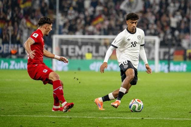 Eldin Dzogovic (LUX) und Nathaniel Brown (GER). xettx, Deutschland, Sinsheim, 10.10.2025, Fussball, Nationalmannschaft, WM-Qualifikation Europa: Deutschland vs Luxemburg, Saison 2025 2026, Matchday 7, PreZerro Arena