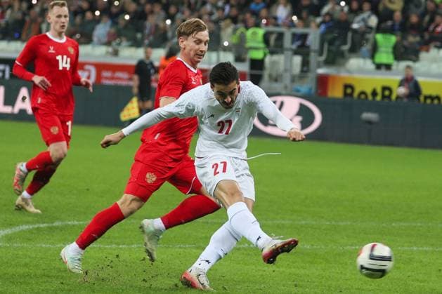 RUSSIA, VOLGOGRAD - OCTOBER 10, 2025: Russia s Nail Umyarov (L) and Iran s Kasra Taheri are in action in a friendly football match between the Russian and the Iranian men s national football teams at Volgograd Arena. Dmitry Rogulin TASS  84737069
