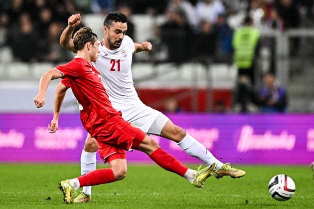 Russia Soccer Friendly Russia - Iran 9023795 10.10.2025 Russia s Aleksey Batrakov and Iran s Omid Noorafkan struggle for the ball during the friendly soccer match between Russia and Iran, in Volgograd, Russia. Sergey Bobylev Sputnik Volgograd Russia  Copyright: xSergeyxBobylevx