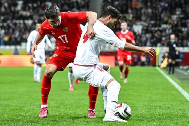 Russia Soccer Friendly Russia - Iran 9023834 10.10.2025 Russia s Zelimkhan Bakaev and Iran s Shoja Khalilzadeh struggle for the ball during the friendly soccer match between Russia and Iran, in Volgograd, Russia. Sergey Bobylev Sputnik Volgograd Russia  Copyright: xSergeyxBobylevx