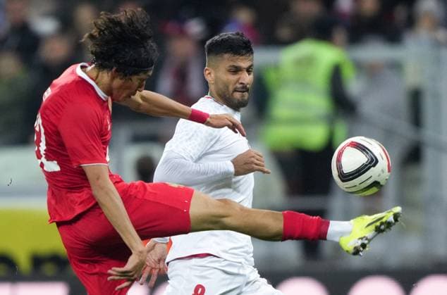 Russia Soccer Friendly Russia - Iran 9023839 10.10.2025 Russia s Mingiyan Beveev kicks the ball as Iran s Mohammad Mohebi looks on during the friendly soccer match between Russia and Iran, in Volgograd, Russia. Alexander Vilf Sputnik Volgograd Russia  Copyright: xAlexanderxVilfx