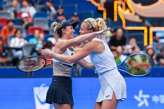 WUHAN, CHINA - OCTOBER 11: Storm Hunter of Australia and Katerina Siniakova of the Czech Republic react in the Women s Doubles Semifinal match against Olivia Nicholls of Great Britain and Tereza Mihalikova of Slovakia on day 8 of 2025 Wuhan Open at Optics Valley International Tennis Center on October 11, 2025 in Wuhan, Hubei Province of China.  Copyright: xVCGx 111596553889