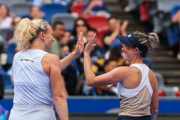 WUHAN, CHINA - OCTOBER 11: Storm Hunter of Australia and Katerina Siniakova of the Czech Republic react in the Women s Doubles Semifinal match against Olivia Nicholls of Great Britain and Tereza Mihalikova of Slovakia on day 8 of 2025 Wuhan Open at Optics Valley International Tennis Center on October 11, 2025 in Wuhan, Hubei Province of China.  Copyright: xVCGx 111596553896