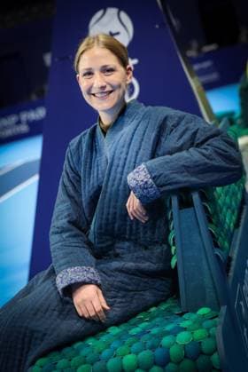 Artist Mathlide poses for the photographer when the players benches are presented, before the European Open ATP, Tennis Herren tennis tournament at the ING Arena Brussels Expo in Brussels, on Saturday 11 October 2025. The European Open will be played from 12 to 19 October 2025. VIRGINIExLEFOUR  x136534880x