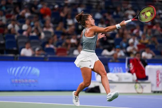WUHAN, CHINA - OCTOBER 11: Jasmine Paolini of Italy returns a shot in the Women s Singles Semifinal match against Coco Gauff of the United States on day 8 of 2025 Wuhan Open at Optics Valley International Tennis Center on October 11, 2025 in Wuhan, Hubei Province of China.  Copyright: xVCGx 111596586843