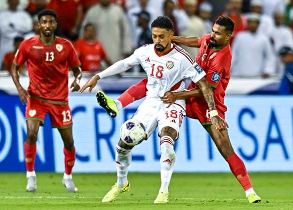 UNITED ARAB EMIRATES v OMAN-2026 FIFA World Cup, WM, Weltmeisterschaft, Fussball ASIAN QUALIFIER PLAYOFFS Caio Fernandes (L) of United Arab Emirates and Nayef Faraj Bait Sabih of Oman in action during the FIFA World Cup 2026 AFC Asian qualifiers playoffs group A match between United Arab Emirates and Oman at Jassim Bin Hamad Stadium in Doha, Qatar, on October 11, 2025. DOHA Qatar Copyright: xNOUSHADx