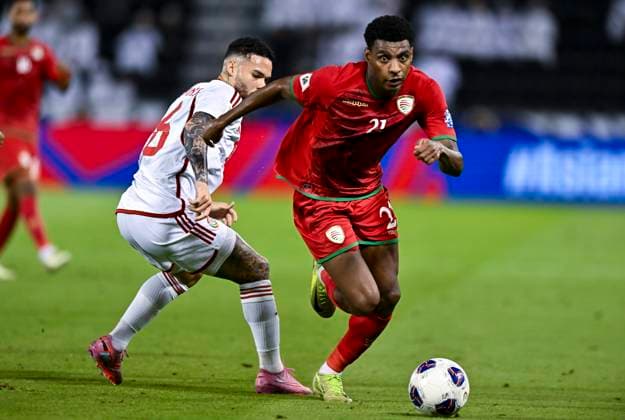UNITED ARAB EMIRATES v OMAN-2026 FIFA World Cup, WM, Weltmeisterschaft, Fussball ASIAN QUALIFIER PLAYOFFS Marcus Vinicius (L) of United Arab Emirates and Abdul Rahman Al Mushaifri of Oman in action during the FIFA World Cup 2026 AFC Asian qualifiers playoffs group A match between United Arab Emirates and Oman at Jassim Bin Hamad Stadium in Doha, Qatar, on October 11, 2025. DOHA Qatar Copyright: xNOUSHADx