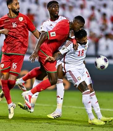 UNITED ARAB EMIRATES v OMAN-2026 FIFA World Cup, WM, Weltmeisterschaft, Fussball ASIAN QUALIFIER PLAYOFFS Caio Fernandes (R) of United Arab Emirates and Thani Gharib Al Rushaidi of Oman in action during the FIFA World Cup 2026 AFC Asian qualifiers playoffs group A match between United Arab Emirates and Oman at Jassim Bin Hamad Stadium in Doha, Qatar, on October 11, 2025. DOHA Qatar Copyright: xNOUSHADx