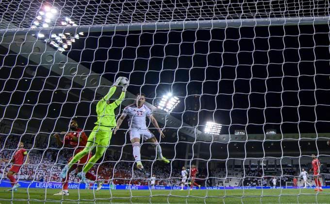 UNITED ARAB EMIRATES v OMAN-2026 FIFA World Cup, WM, Weltmeisterschaft, Fussball ASIAN QUALIFIER PLAYOFFS Oman goalkeeper Ibrahim Saleh Al Mukhaini (L) makes a save from Caio Canedo Correa of United Arab Emirates during the FIFA World Cup 2026 AFC Asian qualifiers playoffs group A match between United Arab Emirates and Oman at Jassim Bin Hamad Stadium in Doha, Qatar, on October 11, 2025. DOHA Qatar Copyright: xNOUSHADx