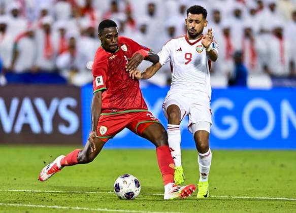 UNITED ARAB EMIRATES v OMAN-2026 FIFA World Cup, WM, Weltmeisterschaft, Fussball ASIAN QUALIFIER PLAYOFFS Harib Abdalla Almusharrkh of United Arab Emirates and Thani Gharib Al Rushaidi of Oman in action during the FIFA World Cup 2026 AFC Asian qualifiers playoffs group A match between United Arab Emirates and Oman at Jassim Bin Hamad Stadium in Doha, Qatar, on October 11, 2025. DOHA Qatar Copyright: xNOUSHADx