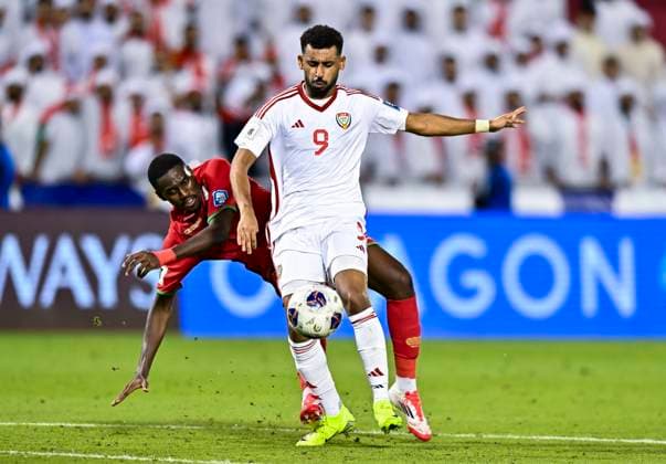 UNITED ARAB EMIRATES v OMAN-2026 FIFA World Cup, WM, Weltmeisterschaft, Fussball ASIAN QUALIFIER PLAYOFFS Harib Abdalla Almusharrkh of United Arab Emirates and Thani Gharib Al Rushaidi of Oman in action during the FIFA World Cup 2026 AFC Asian qualifiers playoffs group A match between United Arab Emirates and Oman at Jassim Bin Hamad Stadium in Doha, Qatar, on October 11, 2025. DOHA Qatar Copyright: xNOUSHADx