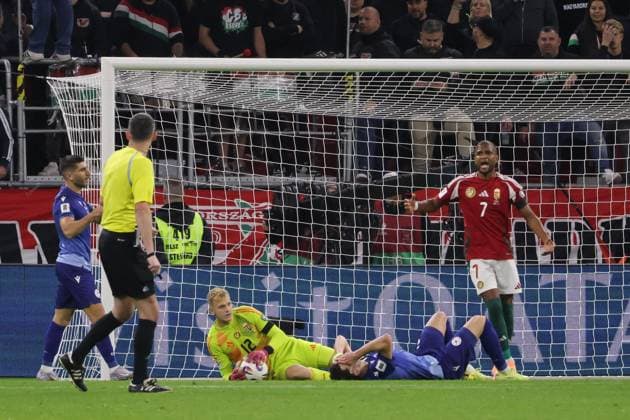 (251012) -- BUDAPEST, Oct. 12, 2025 -- Balazs Toth (C), goalkeeper of Hungary, saves the ball during the 2026 FIFA World Cup, WM, Weltmeisterschaft, Fussball European Qualifiers football match between Hungary and Armenia in Budapest, Hungary, on Oct. 11, 2025. (Photo by Xinhua) (SP)HUNGARY-BUDAPEST-FOOTBALL-FIFA WORLD CUP QUALIFIERS-HUNGARY VS ARMENIA AttilaxVolgyi