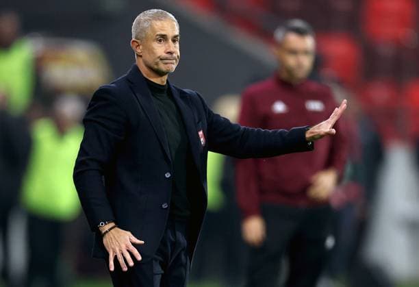 (251012) -- LESKOVAC, Oct. 12, 2025 -- Albania s head coach Sylvinho gestures during the World Cup 2026 European Qualifiers Group K football match between Serbia and Albania in Leskovac, Serbia on Oct. 11, 2025. (Photo by Xinhua) (SP)SERBIA-LESKOVAC-FOOTBALL FIFA World Cup, WM, Weltmeisterschaft, Fussball EUROPEAN QUALIFIERS-SERBIA VS ALBANIA PredragxMilosavljevic 