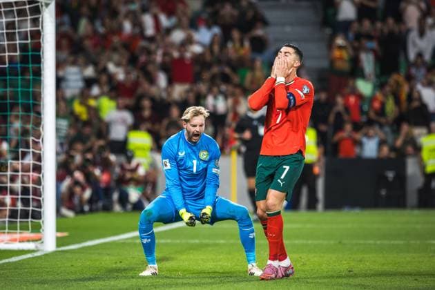October 11, 2025, Lisbon, Portugal: Caoimhin Kelleher of the Republic of Ireland (L) celebrates saving a penalty taken by Cristiano Ronaldo of Portugal (R) during the FIFA World Cup, WM, Weltmeisterschaft, Fussball 2026 qualifier match between Portugal and Republic of Ireland at Estadio Jose Alvalade in Lisbon.(Final score: Portugal 1 - 0 Republic of Ireland) Lisbon Portugal - ZUMAs197 20251011_aaa_s197_650 Copyright: xHenriquexCasinhasx