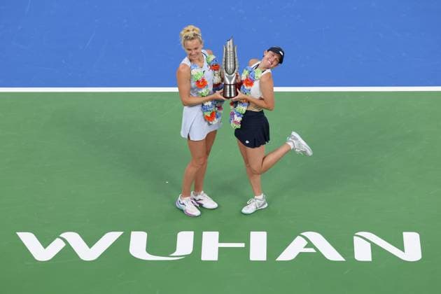 WUHAN, CHINA - OCTOBER 12: Storm Hunter of Australia and Katerina Siniakova of the Czech Republic celebrate with the trophy at the award ceremony after winning the Women s Doubles Final match against Anna Danilina of Kazakhstan and Aleksandra Krunic of Serbia on day 9 of 2025 Wuhan Open at Optics Valley International Tennis Center on October 12, 2025 in Wuhan, Hubei Province of China.  Copyright: xVCGx 111596715229
