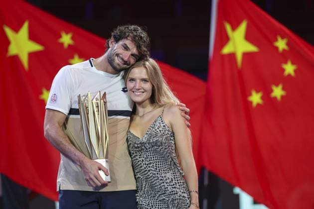 SHANGHAI, CHINA - OCTOBER 12: Valentin Vacherot of Monaco poses for a photo with his girl friend Emily Snyder during the award ceremony after men s singles final match against Arthur Rinderknech of France on day 14 of the 2025 Shanghai Rolex Masters at Qi Zhong Tennis Center on October 12, 2025 in Shanghai, China. (Photo by Qian Jun) Copyright: xQianxJunx Sportspressphoto_SPR41509