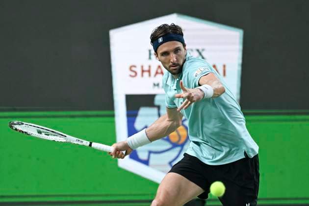 (251012) -- SHANGHAI, Oct. 12, 2025 -- Arthur Rinderknech hits a return during the men s singles final between Arthur Rinderknech of France and Valentin Vacherot of Monaco at the ATP, Tennis Herren World Tour Shanghai Masters tennis tournament in Shanghai, east China, Oct. 12, 2025. ) (SP)CHINA-SHANGHAI-TENNIS-ATP TOUR-SHANGHAI MASTERS-MEN S SINGLES (CN) ChenxHaoming 