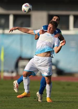 Serravalle, Italy, 12th October 2025. Konstantinos Laifis of Cyprus clashes with Nicola Nanni of San Marino during the San Marino vs Cyprus FIFA World Cup, WM, Weltmeisterschaft, Fussball European Qualifying match at San Marino Stadium, Serravalle. Picture credit should read: Jonathan Moscrop Sportimage EDITORIAL USE ONLY. No use with unauthorised audio, video, data, fixture lists, club league logos or live services. Online in-match use limited to 120 images, no video emulation. No use in betting, games or single club league player publications. SPI_006_JM_SANMARINO_CYPRUS_EQ SPI-4191-0006
