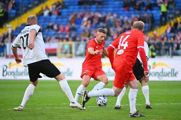 CHORZOW 12.10.2025 MIEDZYNARODOWY MECZ TOWARZYSKI: POLSKA - NIEMCY --- International Friendly, Länderspiel, Nationalmannschaft FOOTBALL MATCH: POLAND - GERMANY LUKAS PODOLSKI W KOSZULCE POLSKI FOT. KRZYSZTOF HELIOS 400MM NEWSPIX.PL --- newspix.pl POLAND OUT! 