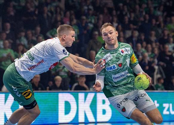 Handball, Herren, Saison 2025 2026, DAIKIN Handball-Bundesliga (8. Spieltag), Füchse Berlin - TSV GWD Minden, v.l. Karolis Antanavicius (Minden), Mathias Gidsel (Füchse Berlin), 12.10.2025, Copyright: xSebastianxRäppold MatthiasxKochx