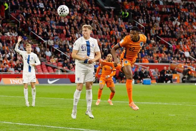 Ville Koski of Finland, Denzel Dumfries of the Netherlands Netherlands v Finland, FIFA World Cup, WM, Weltmeisterschaft, Fussball 2026 Qualifier, Netherlands v Finland, Johan Cruijff Arena, October 12, 2025, Amsterdam, Netherlands.