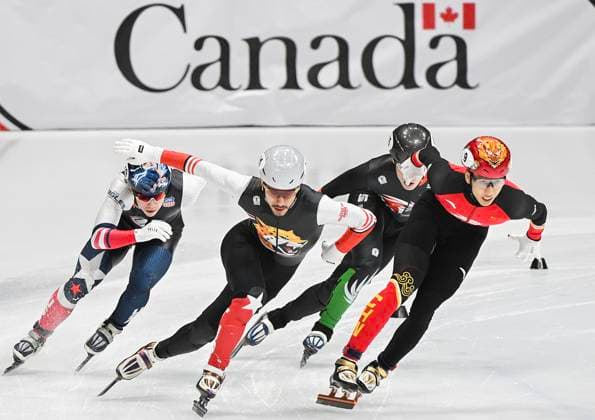 October 12, 2025, Montreal, Pq, Canada: Sun Long of China (9) takes a turn ahead of the pack during the 1000m repechage quarterfinal race at the ISU Short Track World Tour speedskating event in Montreal, Sunday, Oct. 12. 2025. Sun Long,  - ZUMAc35_ 20251012_zaf_c35_002 Copyright: xGrahamxHughesx