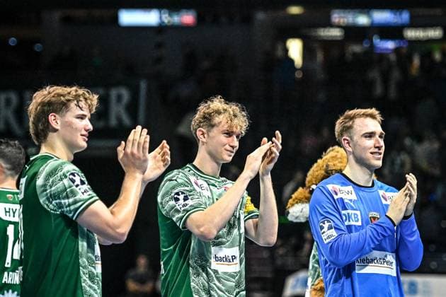12.10.2025, xlakx, Handball Daikin HBL, Fuechse Berlin - GWD Minden v.l. Jonas Kofler (Fuechse Berlin), Felix Bernkop-Schnuerch (Fuechse Berlin), Lasse Ludwig (Fuechse Berlin) Jubel ueber den Sieg, Jubel nach Spielende Berlin