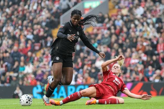 Gemma Bonner (23 Liverpool) clears the ball from Khadija Bunny Shaw (9 Manchester City) during the Barclays Womens Super League fixture between Liverpool and Manchester City at Anfield in Liverpool, England Copyright: xNataliexMincher SPPx Sportspressphoto_SPR41601